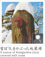 ڂԂnl A statue of Ksitigarbha (Jizo) covered with snow